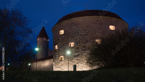 Photos Illuminated Fat Margaret Tower and Medieval City Wall at Night in Tallinn