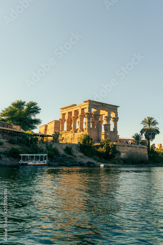 Photography Philae Temple reflected on the Nile River in Aswan Egypt