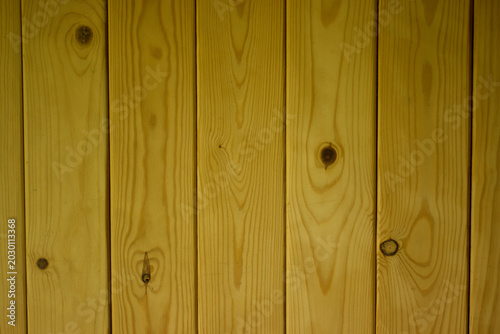 Billede på lærred Surface of vertically arranged natural wooden planks with visible wood grain and