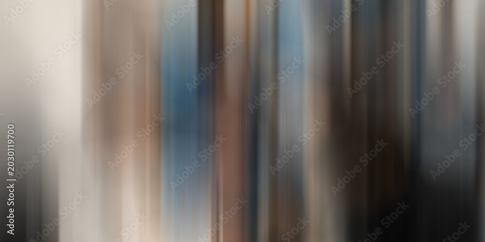 Obraz premium Abstract motion blur background with vertical lines in soft neutral tones