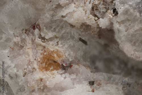 Canvas Print Extreme macro of rare Zorite and Raite crystals with black Aegirine and red Eudi