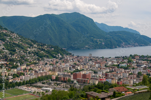 Lugano Cityscape Aerial View with Ceresio Lake and Monte Bré in the background