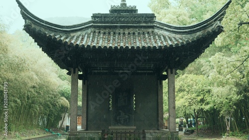 Canvastavla Traditional Chinese pavilion surrounded by bamboo forest in the rain