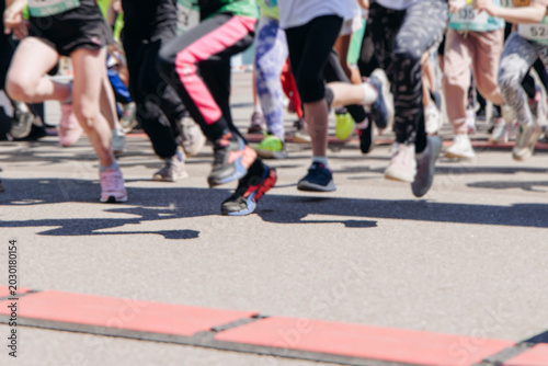 Canvas Print Children marathon runners crowd, young teen sportsmen participants start running