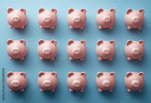 Pink Piggy Banks Grid Pattern on Blue Background