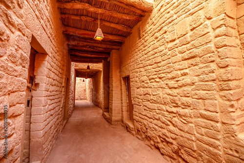 Bild auf Leinwand AlUla Old Town alley revealing narrow mud-brick passages and wooden ceilings, sh