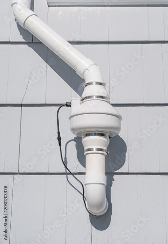 radon mitigation installed system outside the house