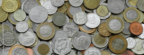 Obraz na płótnie Scattered coins of multiple origins in big mound, detailed shot