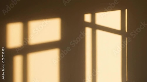 Sunlight Casts Window Shadows Moving Across Wall