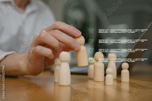 Concept of leader in success team, human resource manager analysing organisation team. choosing head of project manager, Assessment of skills, development and improvement working with ai