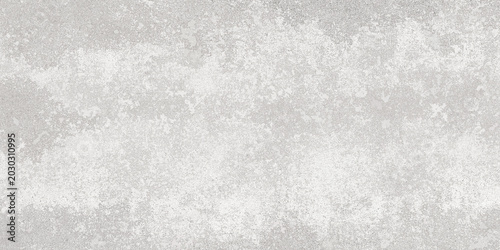 Foto A pale grey, almost white, speckled texture characteristic of distressed wall plaster
