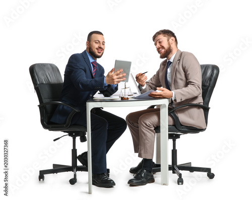 Happy businessmen with docu...
