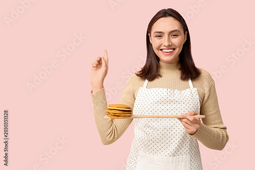 Happy young woman with tast...