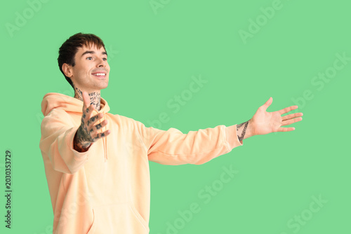 Young man opening arms for ...