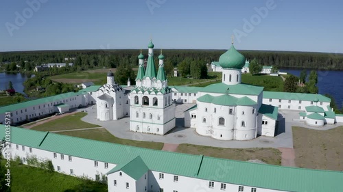 Tilt down aerial shot of Alexander-Svirsky Monastery on sunny summer day. Leningrad Oblast, Russia.