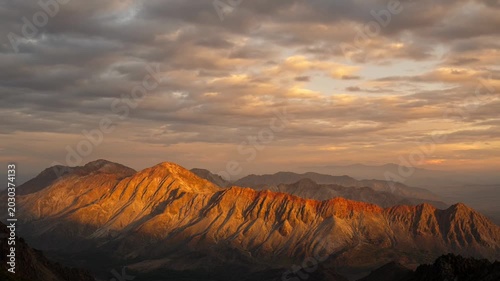 Mountain range at sunrise or sunset.