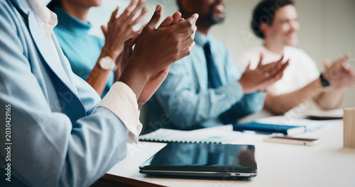 Tableau sur toile Meeting, clapping hands and business people with tablet in office for funding approval and success