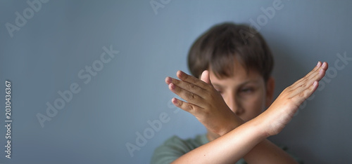 Cuadro en lienzo stop gesture banner, a child crosses their arms in front of them
