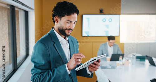Fotografie Smile, business and man with tablet in meeting for research, finance charts and profit growth