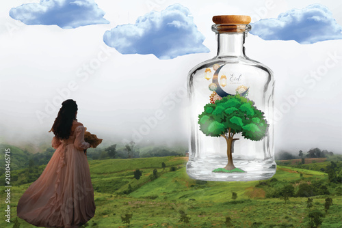 a bottle of tree with Eid Mubarak in a vineyard