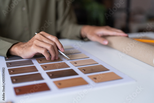 Architecture interior Man Creative project plan designer home and Choose interior materials.