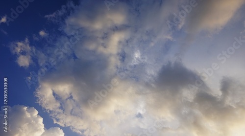 sky background, yellow clouds in the afternoon, beautiful cumulus clouds