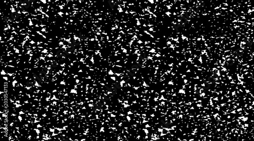 Obraz na plátně Abstract speckled texture on black background, grainy pattern