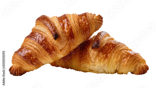 Tableau sur toile Golden brown flaky croissants stacked together, isolated on transparent backgrou