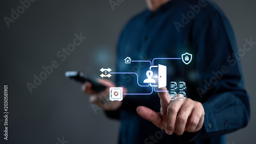 Digital access control and secure user identity authentication concept. Businessman using a smartphone with a virtual open door login icon, safety shield, and approved documents.