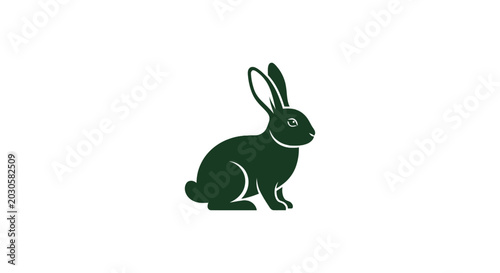 Foto Dark green rabbit silhouette sitting down.