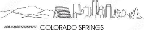 Foto Simple line art depicts a Colorado Springs city skyline with mountains beyond