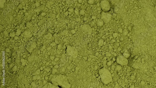 Zoom frame matcha green tea powder close up, rotation. Moringa, Spirulina, chlorella superfoods