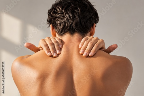 Male with Neck Pain – Muscle Stiffness and Sports Injury Close Up