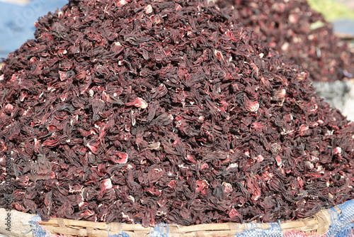 Bild auf Leinwand A lot of hibiscus sabdariffa displays its ruby ​​red color and tangy taste