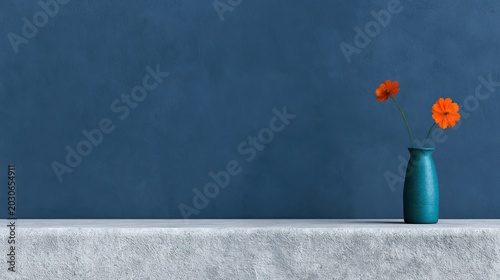 Two small orange flowers in a turquoise vase on a textured surface