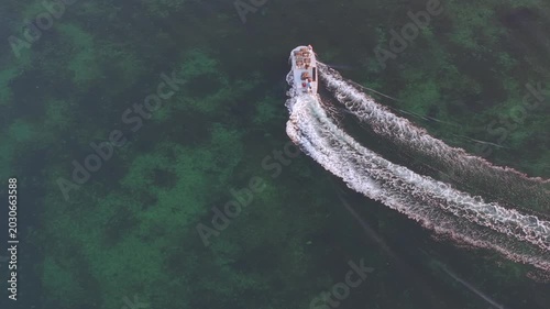 Oyster boat at sunrise on the Thau lagoon, Occitanie, France