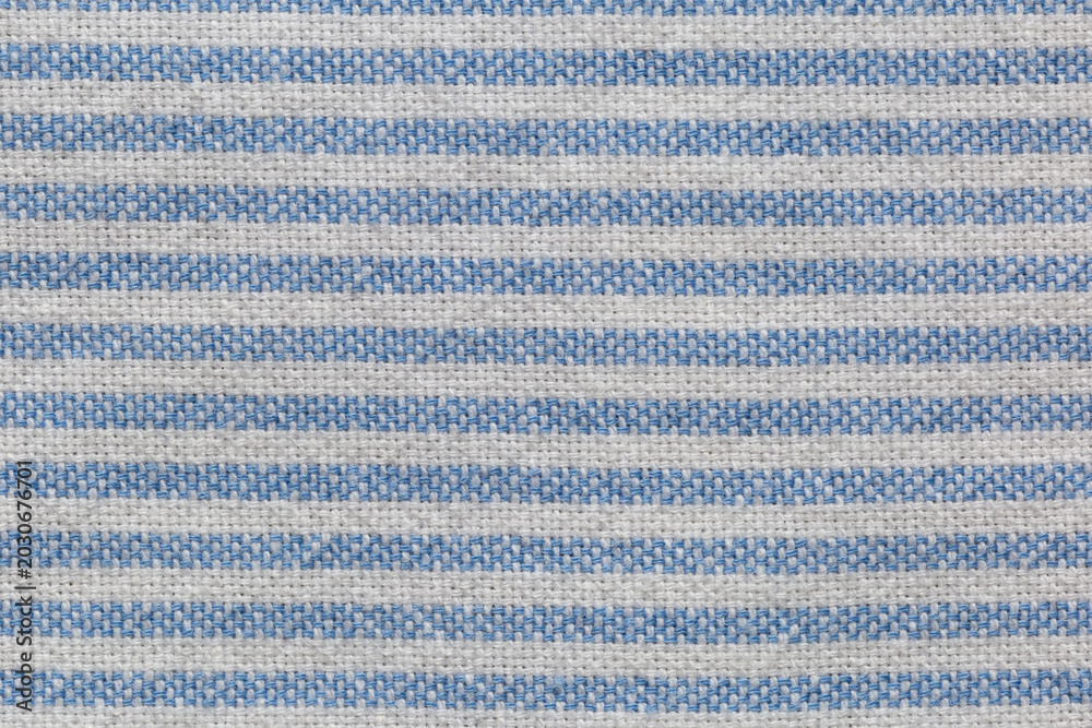 Fototapeta premium macro of blue and white fabric linen striped texture