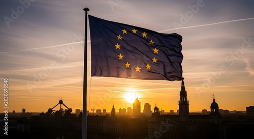 European Union flag waving over Brussels city skyline at golden sunset