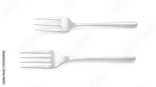 Shiny Stainless Steel Forks Lying Side by Side on White Background