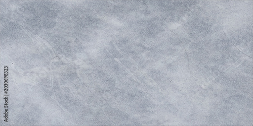 Fotografie An abstract blue paper texture with frost and light patterns creates a cold wint