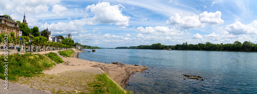 Bild auf Leinwand Panorama of the Rhine promenade in Eltville with riverbank, historic buildings o