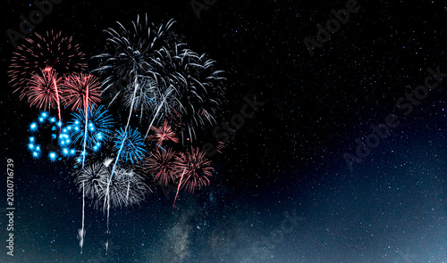 Red and Blue Fireworks on night background