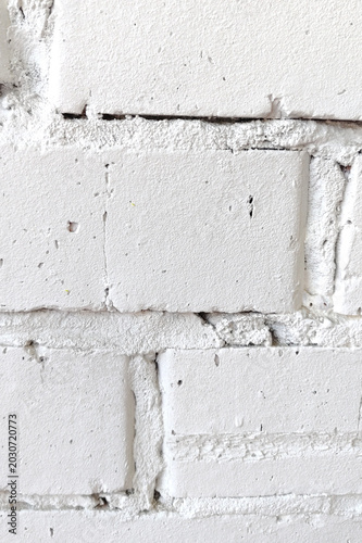 Canvas-taulu White painted brick wall closeup texture background, rough masonry surface, urban architecture detail, abstract construction pattern