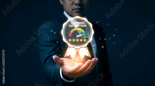 Customer satisfaction guarantee badge, businessman holding glowing five star rating icon, premium service quality and feedback concept