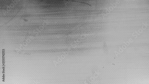Close up texture background of grey perforated woven mesh fabric