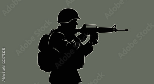 Soldier in combat gear holding rifle.