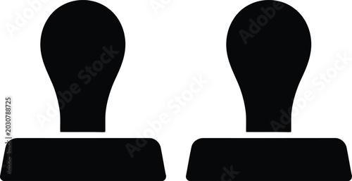 Foto Two black pawn chess pieces standing side by side