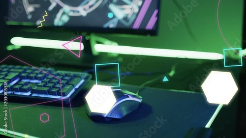 Shapes appearing and drifting across green LED desk, clustering near wired mouse, promoting product