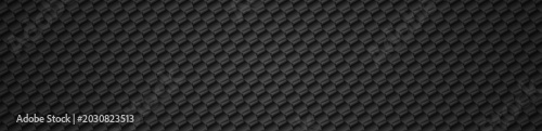 Dark diagonal carbon tile texture with black gray shading.