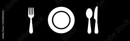Obraz  z motywem Simple illustration of a plate setting with fork, plate, spoon, and knife on a black background